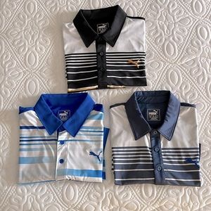3 puma golf shirts 1 Black and white, one Royal blue and white, and gray white